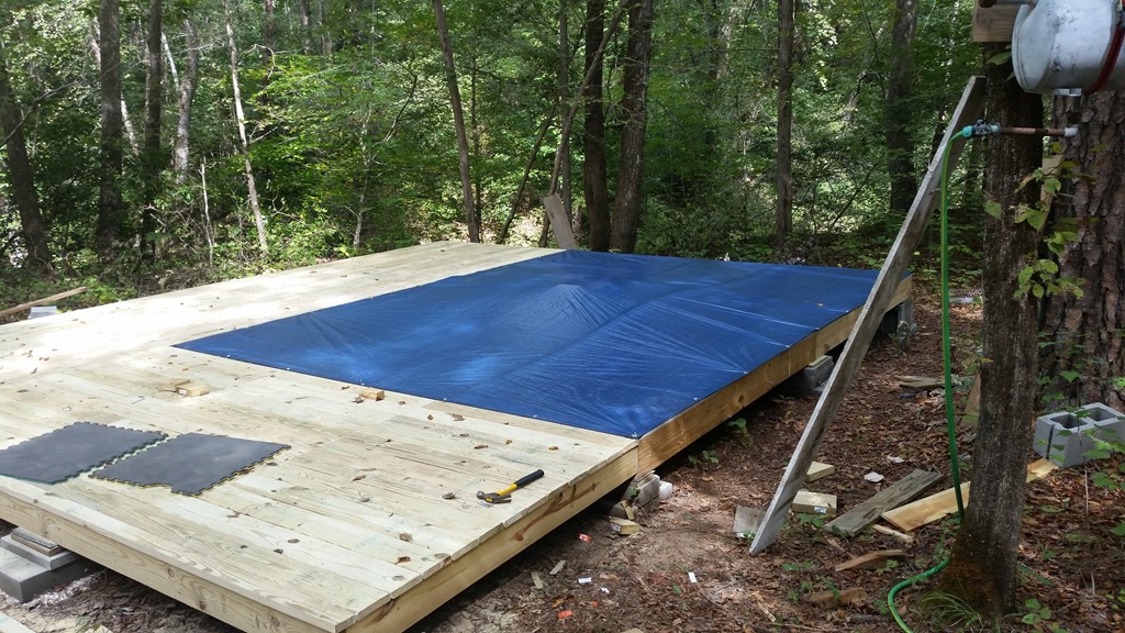 Foundation tarped between work trips