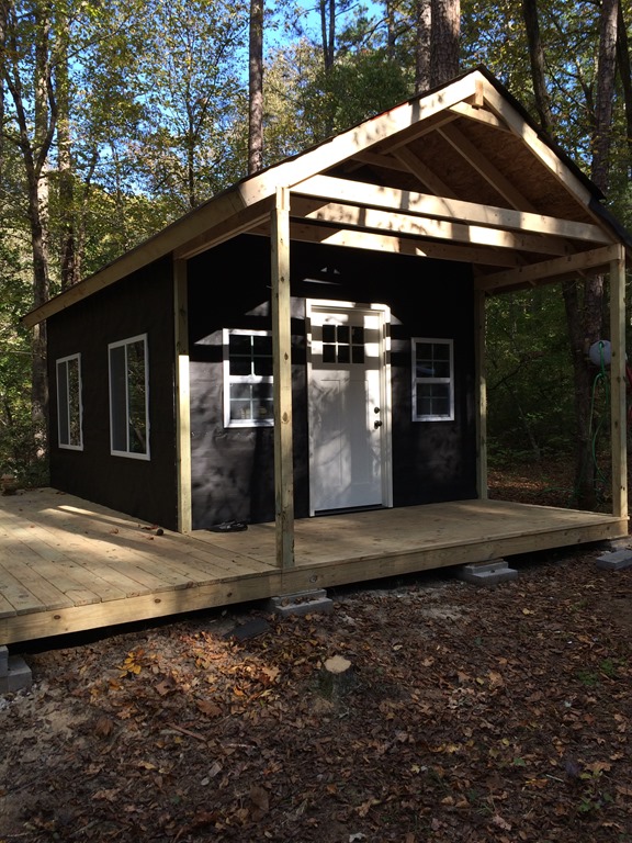 Cabin sealed in tar paper and cleaned up