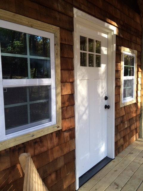 Cedar siding on the tiny cabin