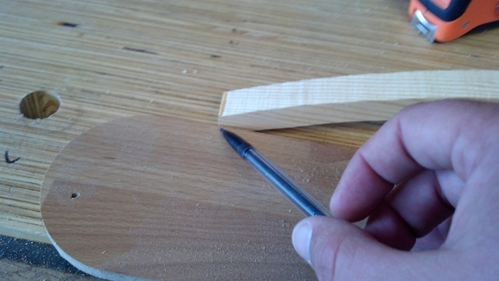 Fitting curved back supports into the straight backpack frame rails